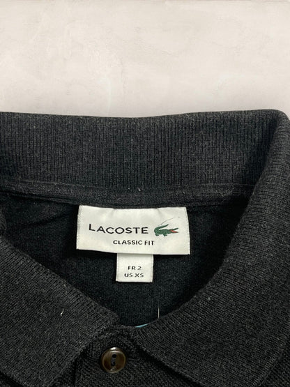 Polo Lacoste Gris XS Femme Ref: 1127 - Gris - XS - amifrip - Friperie en ligne et vêtements vintage
