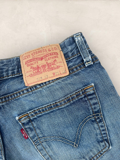 Short Levi’s Bleu W29 Femme Ref: 2746 - Bleu - W29 - amifrip - Friperie en ligne et vêtements vintage